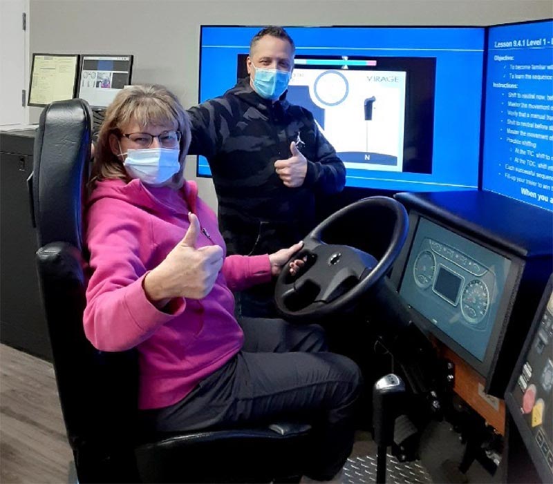 Women Shifting Gears Student with Custom Driver Simulation Training