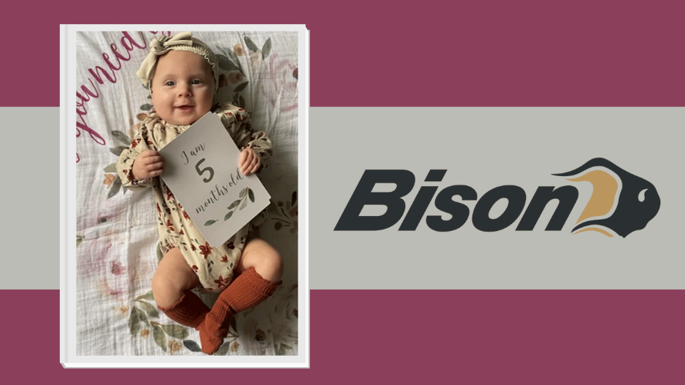 5 Month Old Baby Posing with Bison Logo